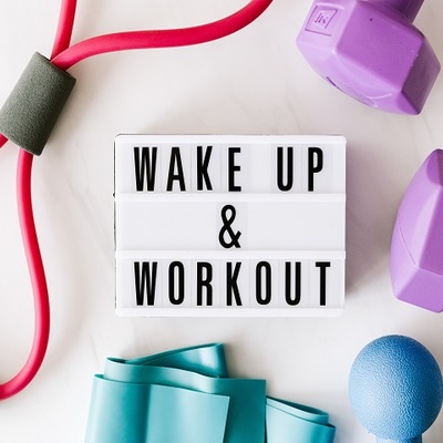 https://www.pexels.com/photo/wake-up-and-workout-title-on-light-box-surface-surrounded-by-colorful-sport-equipment-4397841/
