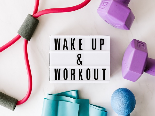 https://www.pexels.com/photo/wake-up-and-workout-title-on-light-box-surface-surrounded-by-colorful-sport-equipment-4397841/